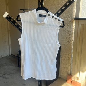 White sleeveless sweater blouse